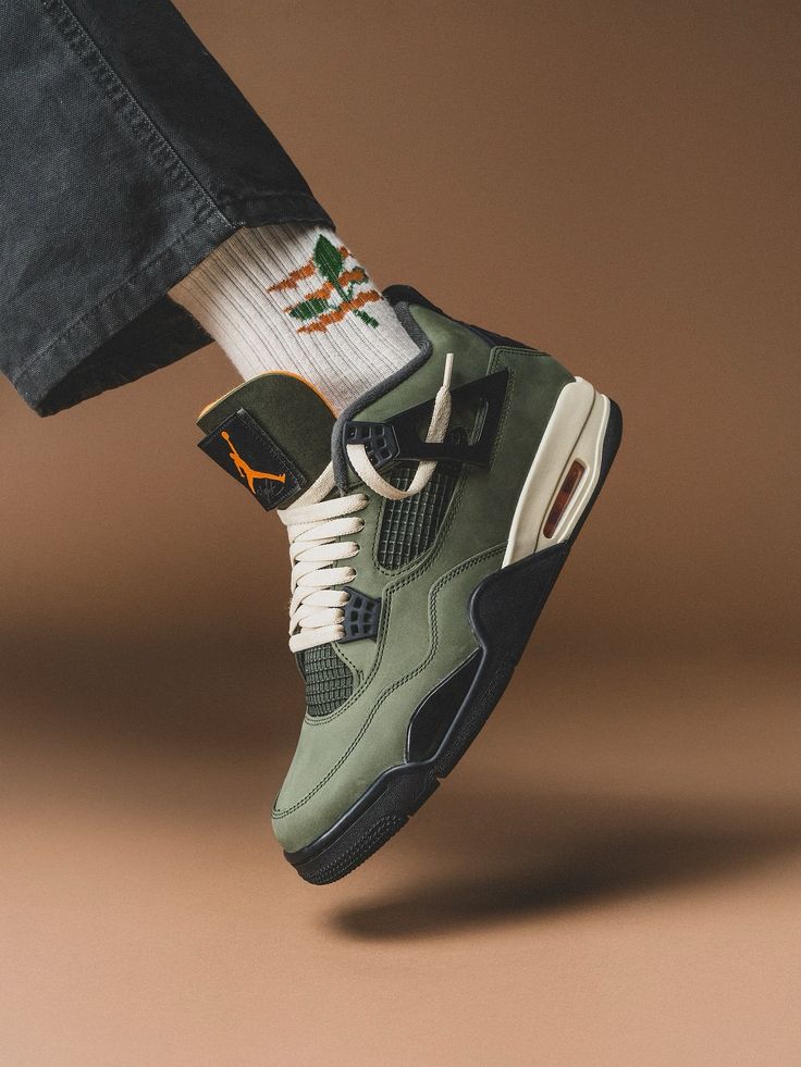 Jordan 4 Retro OG SP Unbesiegt